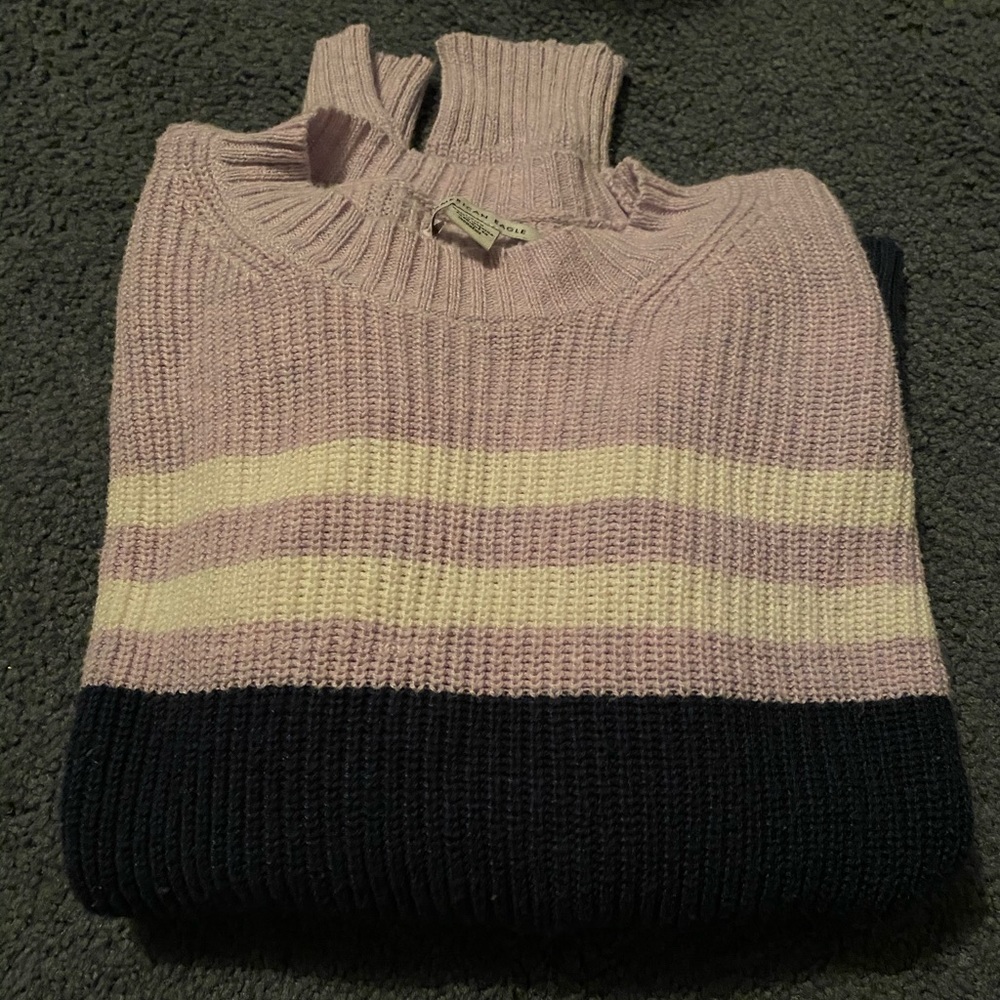 purple, white, & navy blue striped sweater.